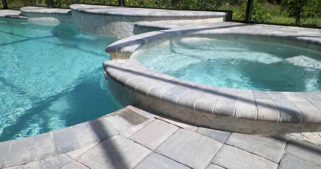 Pool Deck Pavers vs. Wood Decking - Waterscapes Pools & Spas