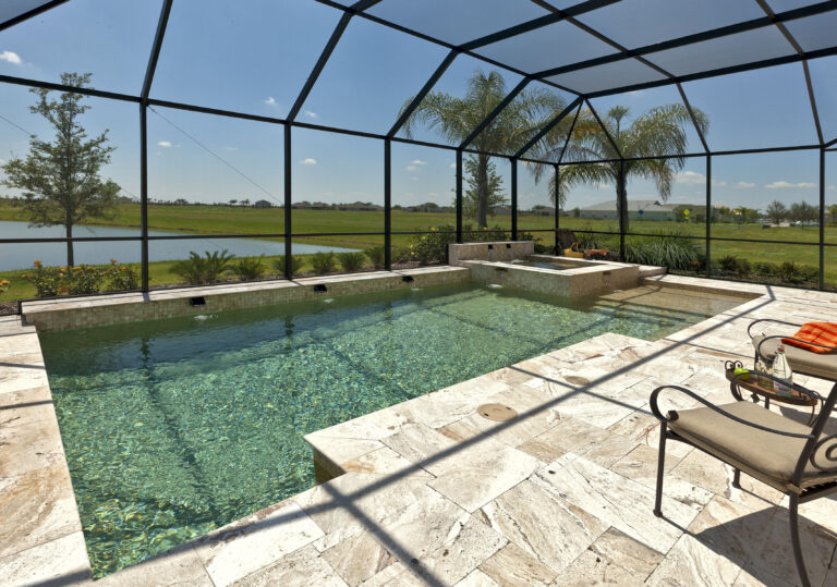 a pool with a hot tub and a pool in the back
