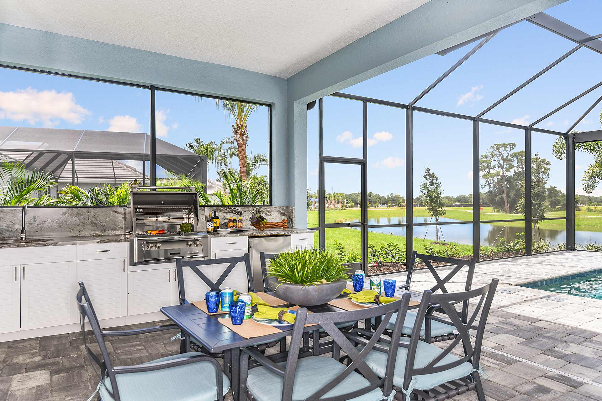 a patio with a table and chairs